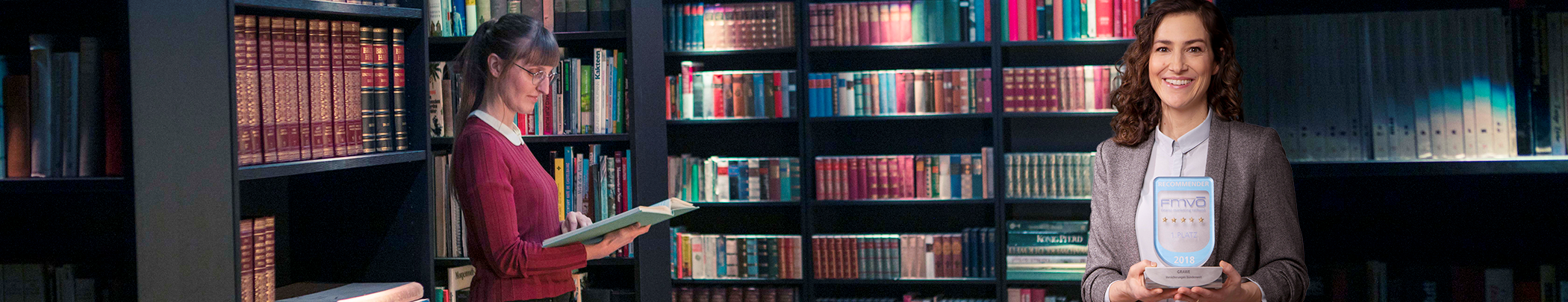 GRAWE - die meistempfohlene Versicherung Österreichs Frau in einer Bibliothek